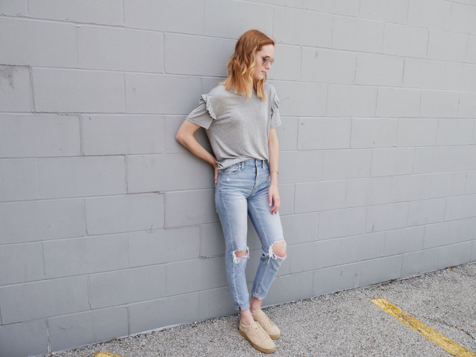 ruffled sleeves and ripped jeans