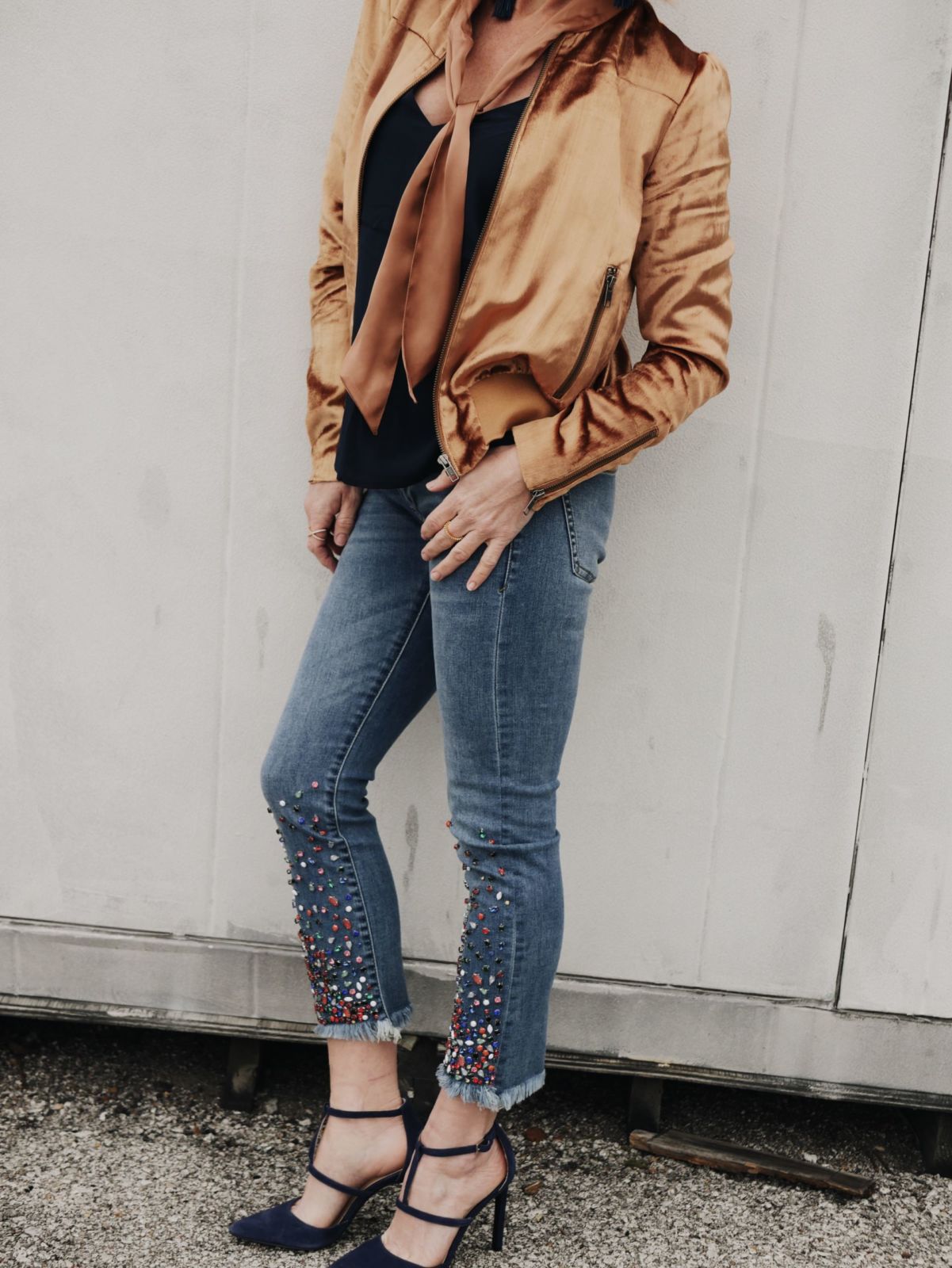 jean pants and blue heels