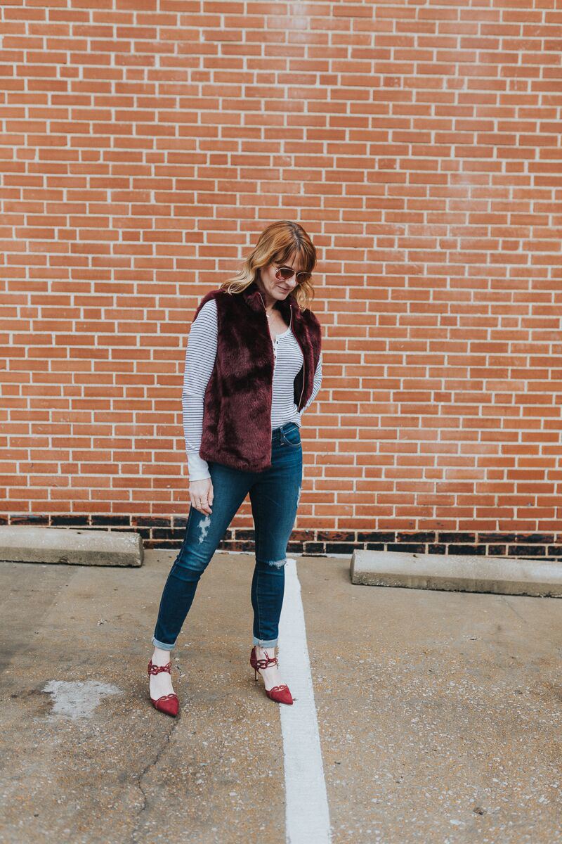 Katie Shelton shares how to wear a henley tee with faux fur vest