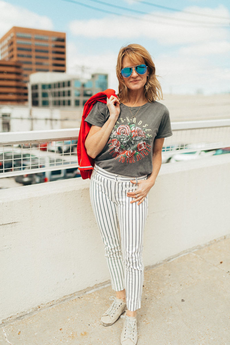 striped pants and graphic tee outfit