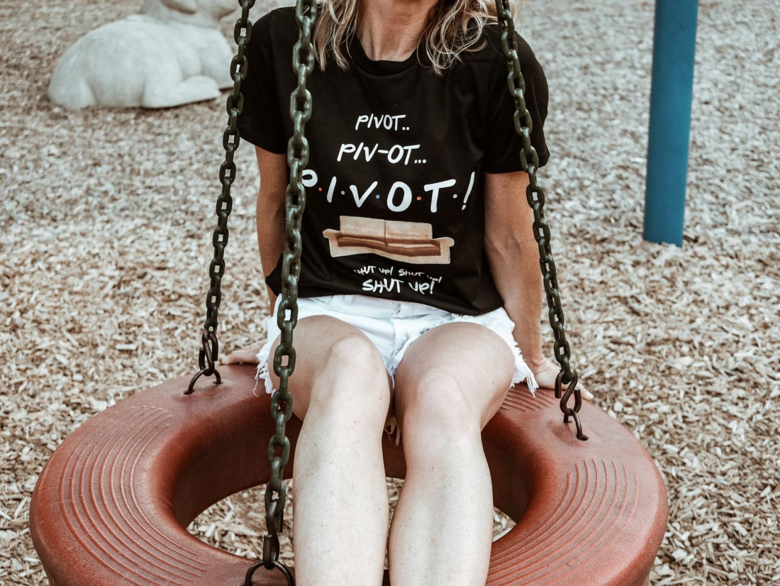 white agolde parker shorts and graphic tee