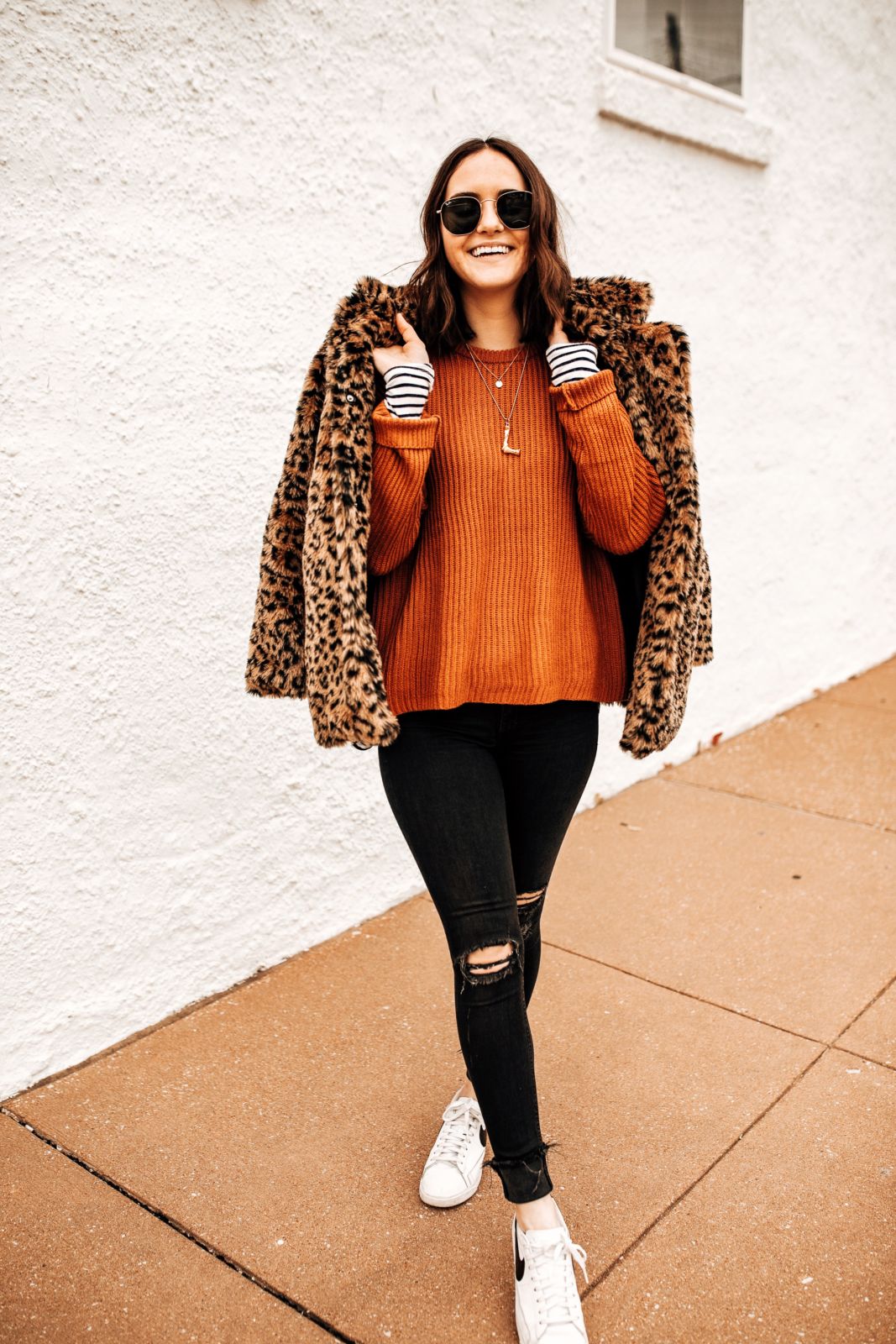 how to layer for winter | long sleeve shirt | sweater | leopard jacket | distressed black jeans | white nike sneakers | oh darling blog