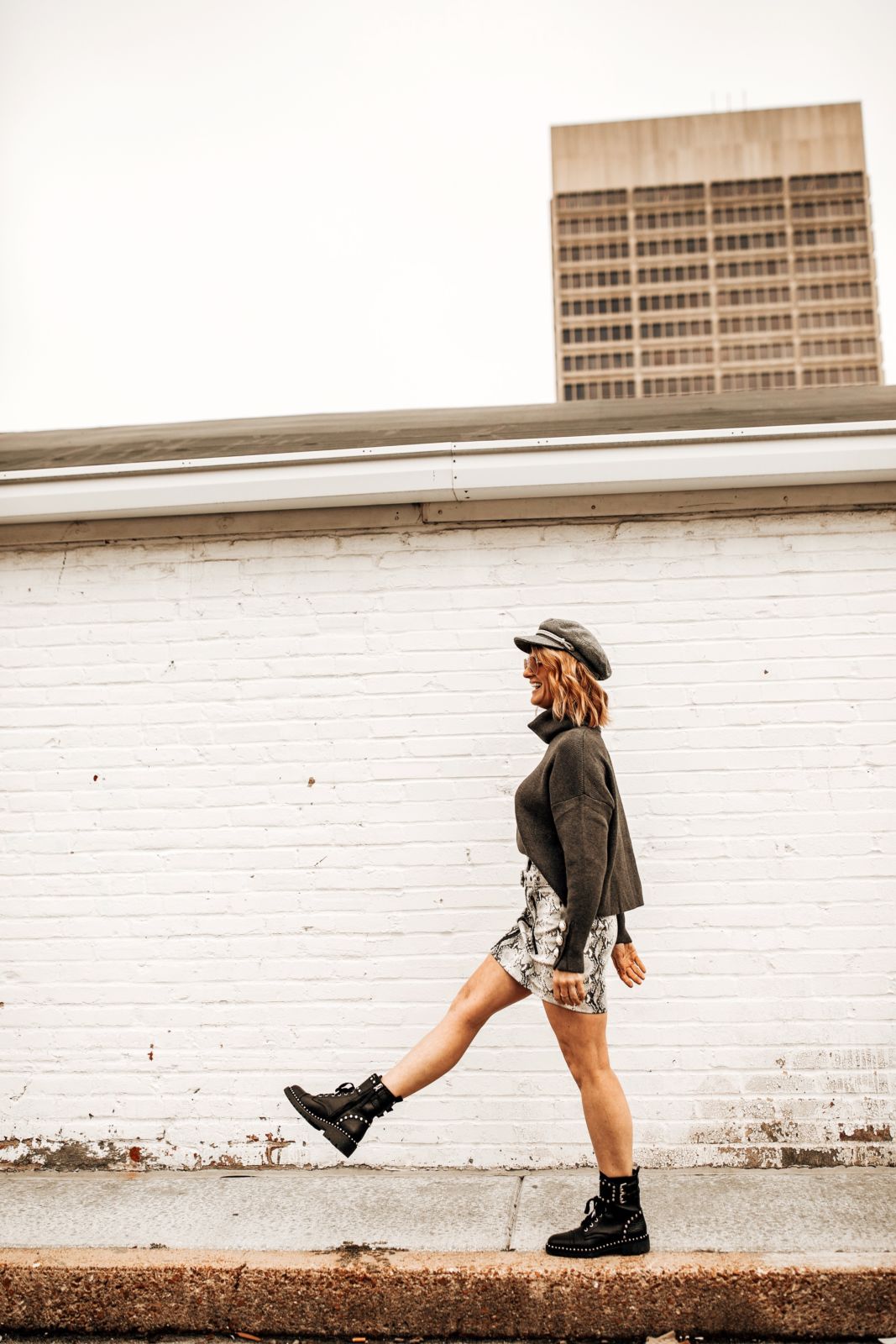 snake print outfit | snake print skirt | combat boots | sweater | hat | oh darling blog