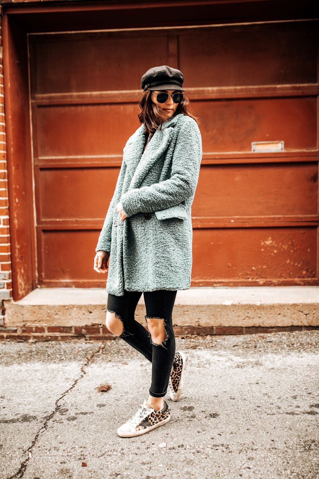 how to layer for winter | blue winter coat | distressed black jeans | golden goose leopard sneakers | oh darling blog