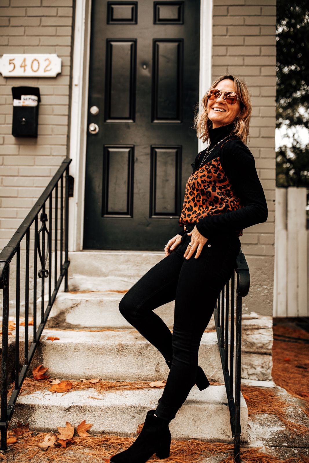 how to layer for winter | all black outfit | leopard camisole | oh darling blog