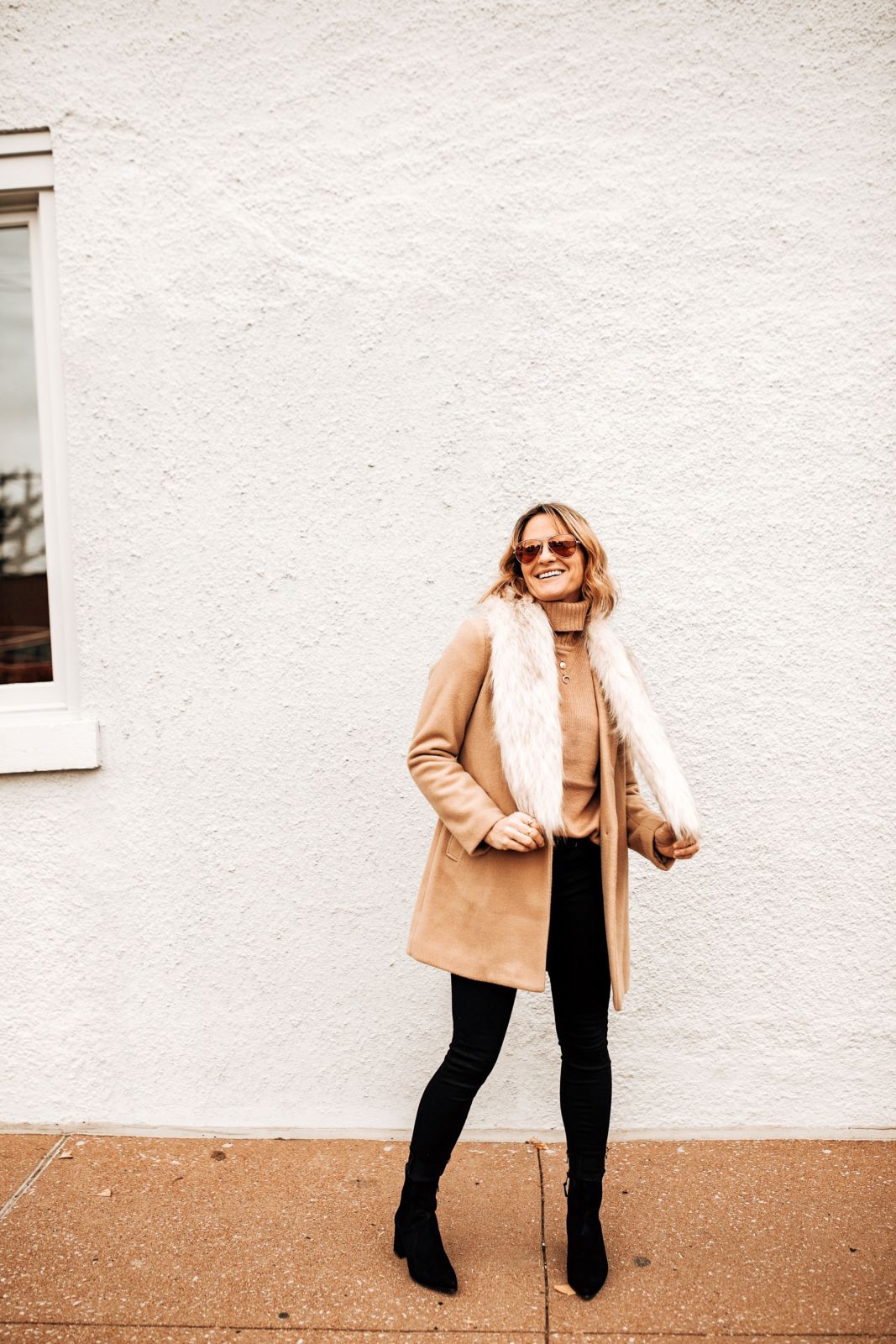 how to layer for winter | faux fur scarf | tan coat | black jeans | black boots | oh darling blog