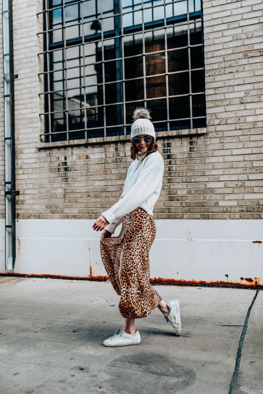 how to style a leopard skirt | golden goose sneakers | leopard skirt | white sweater | white beanie | oh darling blog