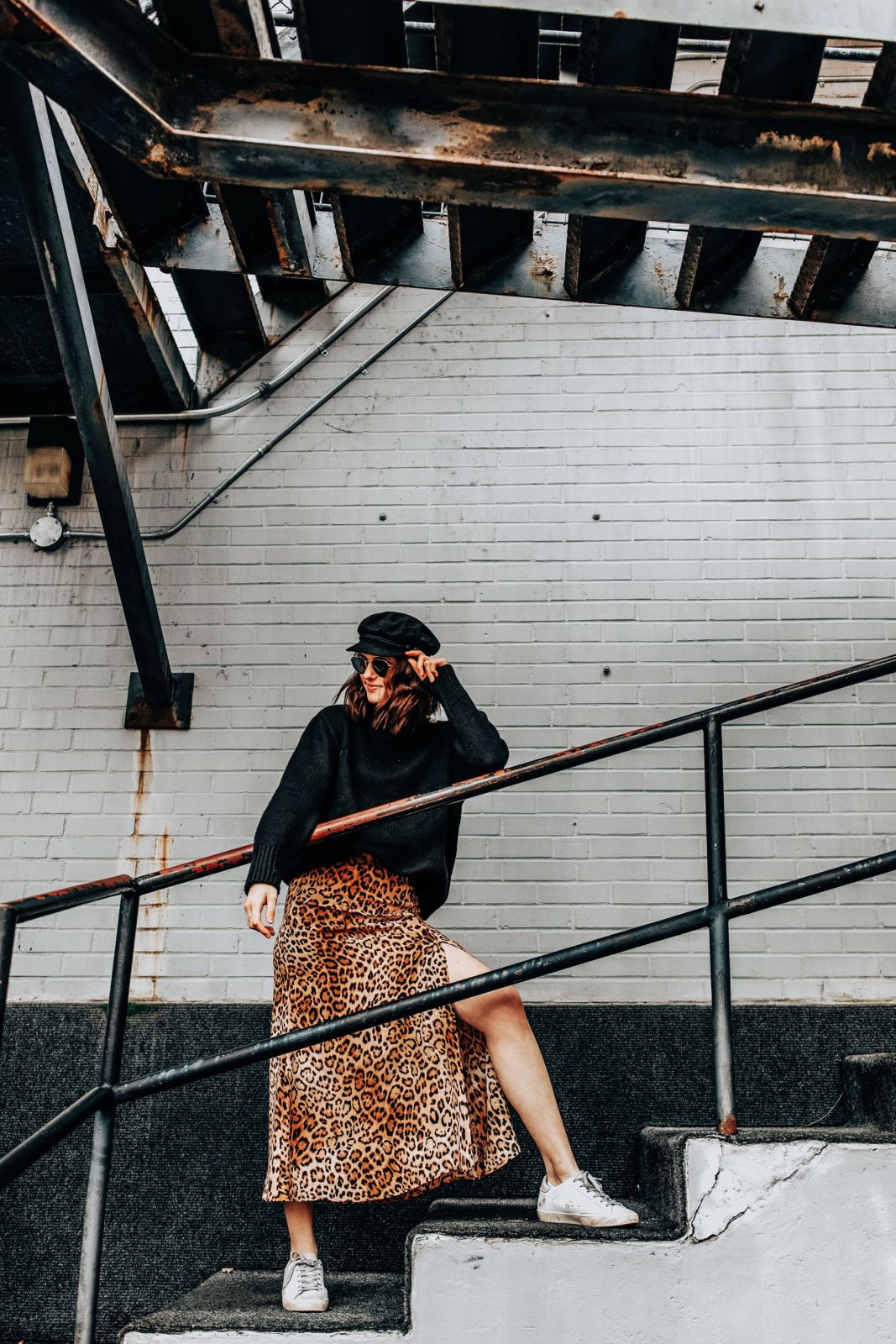 how to wear a leopard skirt | white sneakers | leopard skirt | black sweater | brixton hat | oh darling blog