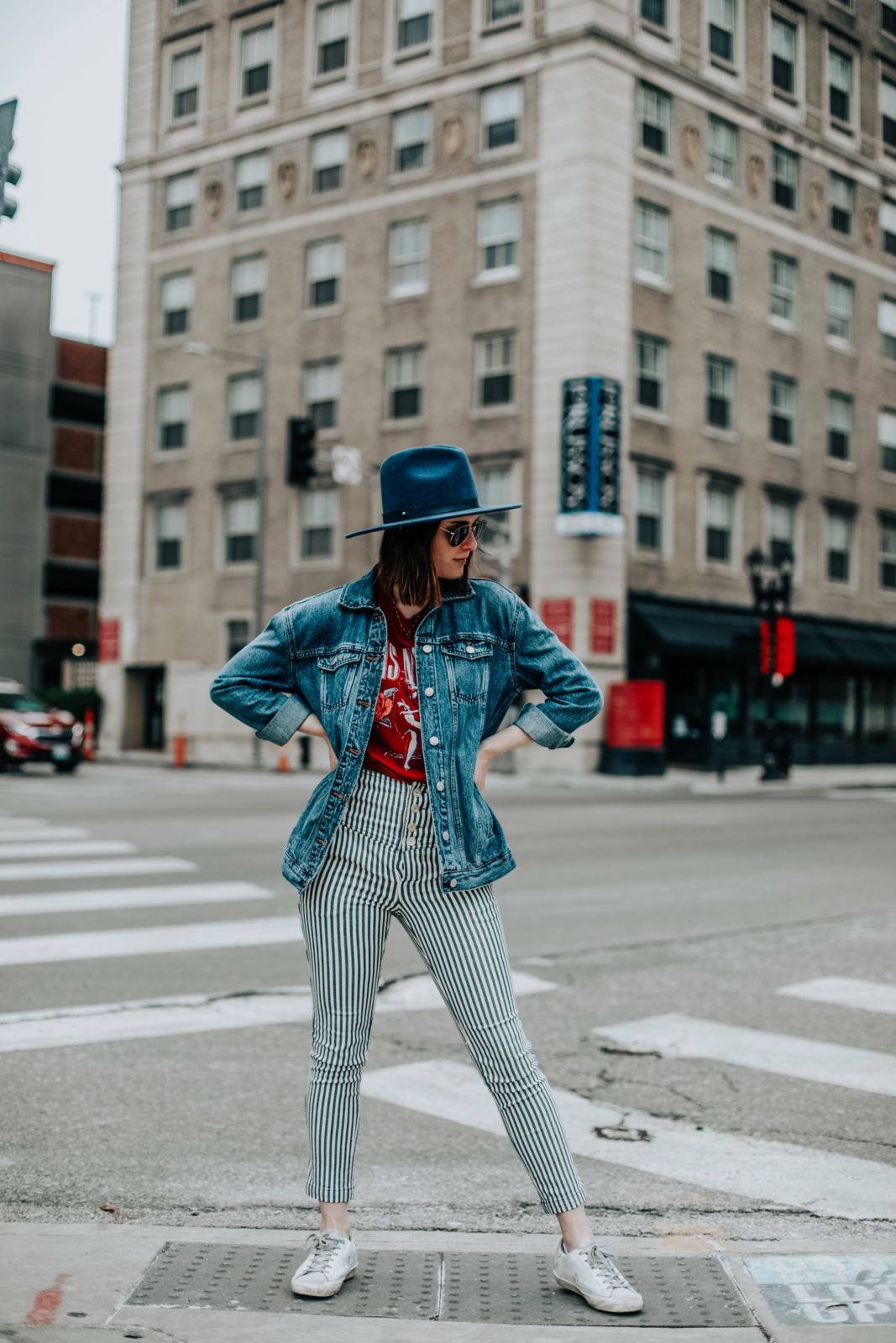 how to style striped pants | free people | daydreamer graphic tee | denim jacket | lack of colors hat | golden goose sneakers | spring style | oh darling blog