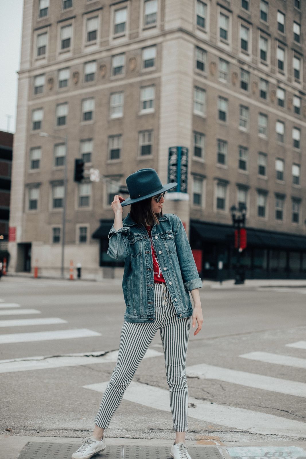 outfit ideas without jeans | striped pants | lack of colors hat | golden goose sneakers | spring style | street style | denim jacket | oh darling blog