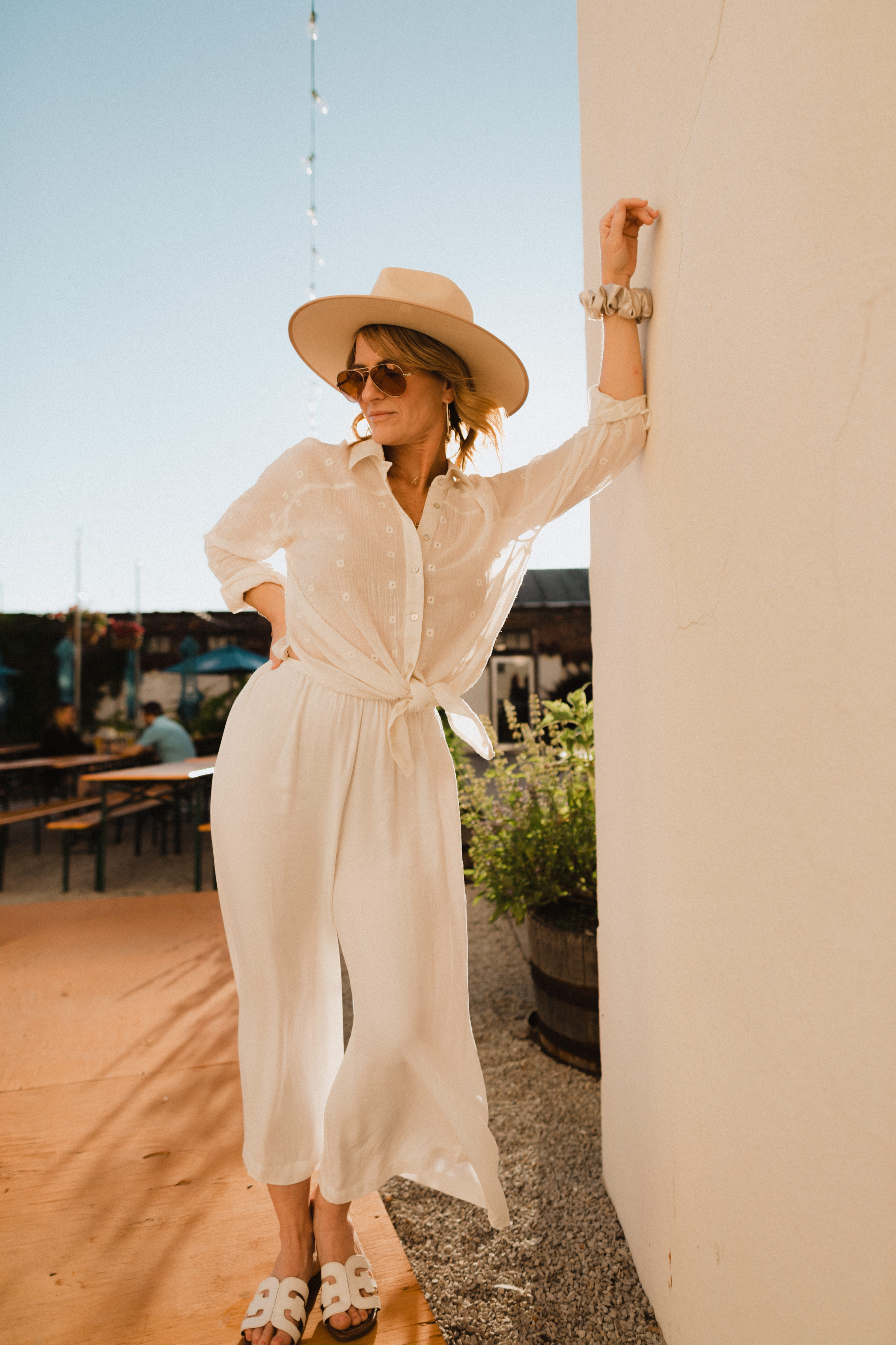 Lovestitch Clothing: 7 Outfits To Wear This Summer | white blouse outfit summer | white blouse outfit casual | white wide leg pants outfit | white wide leg pants | white wide leg pants outfit summer | summer outfit inspiration | lack of color hat outfit | Oh Darling Blog